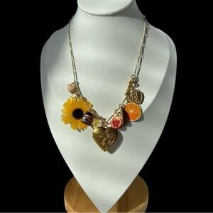 Charming Gold Necklace with Floral and Fruit Charms